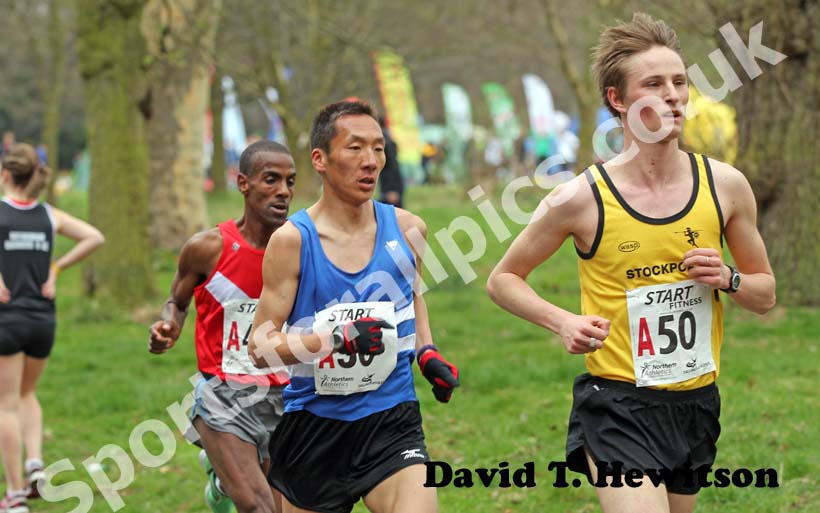 Jack Martin (Stockport Harriers) leads Serod Batochir (Morpeth Harriers) in the Northern 12 Stage Relay.